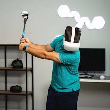 Person playing golf in VR simulator with panoramic screen